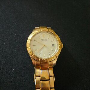 Gold Fossil watch
